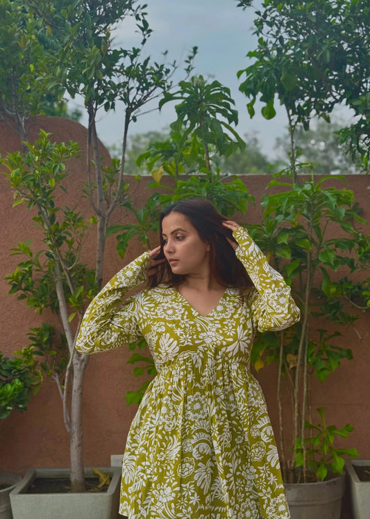 Yellow floral printed A-line dress with v-neck, full sleeves, soft cotton fabric, and elegant relaxed fit for women by An-Attire.