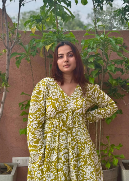 Yellow floral printed A-line dress with v-neck, full sleeves, soft cotton fabric, and elegant relaxed fit for women by An-Attire.