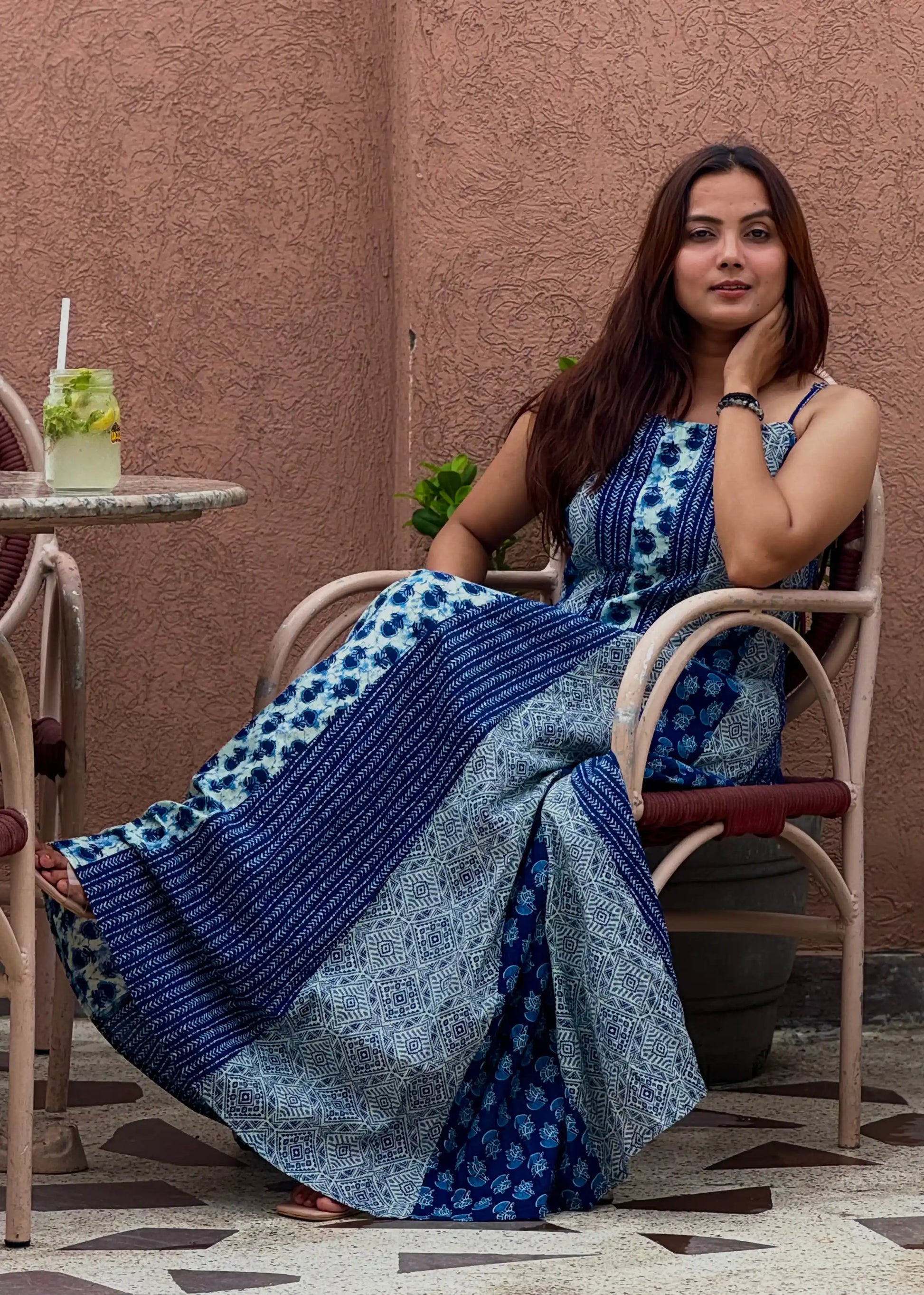 Blue patchwork print sleeveless boho maxi dress with flowy fit and soft fabric for women by An-Attire.
