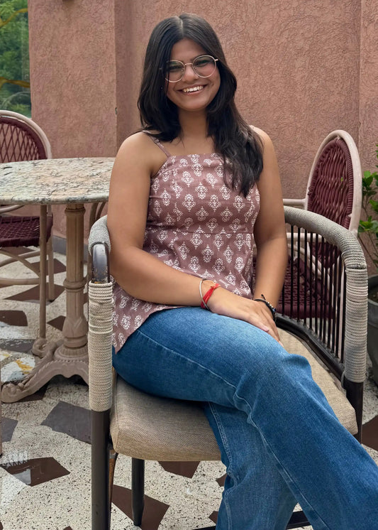 Mauve sleeveless lace-up back floral top with white motifs and relaxed fit, soft cotton women’s wear by An-Attire.