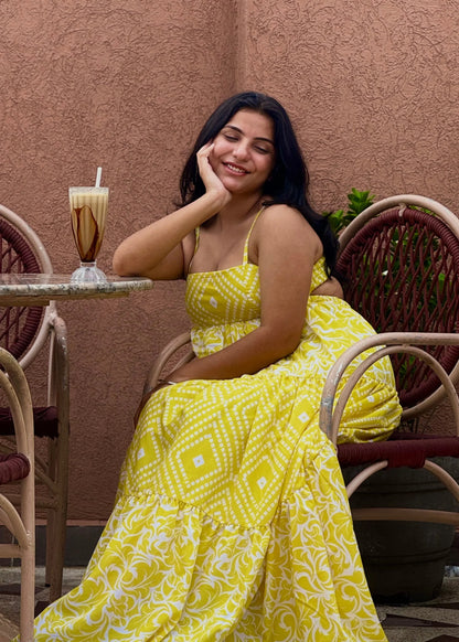 Sunshine Yellow Printed Maxi Dress with geometric and floral patterns, soft fabric, and a flowing summer silhouette by An-Attire.