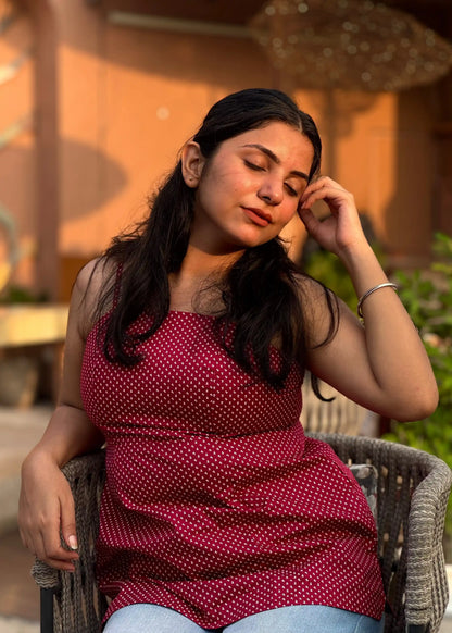 Rose pink sleeveless polka dot top with soft fabric, relaxed fit, and round neckline for women’s summer wear by An-Attire.