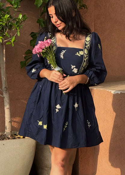 Navy embroidered floral smock dress with puff sleeves and square neckline, soft cotton, women’s elegant wear by An-Attire.