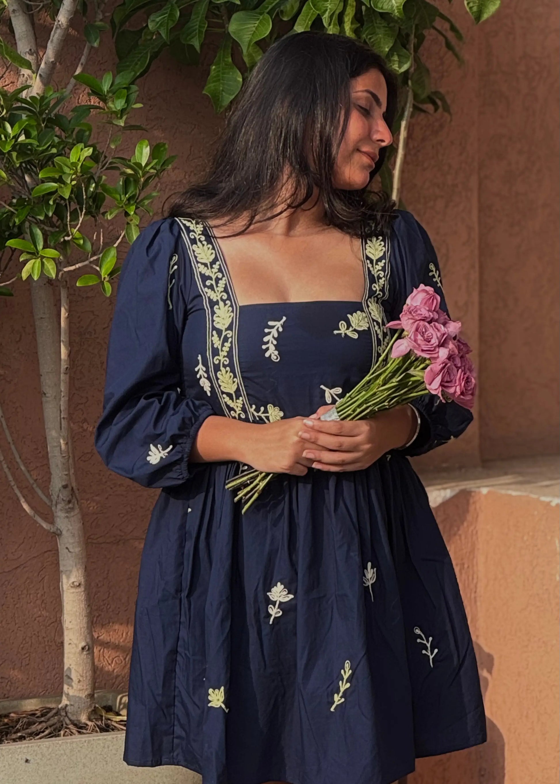 Navy embroidered floral smock dress with puff sleeves and square neckline, soft cotton, women’s elegant wear by An-Attire.