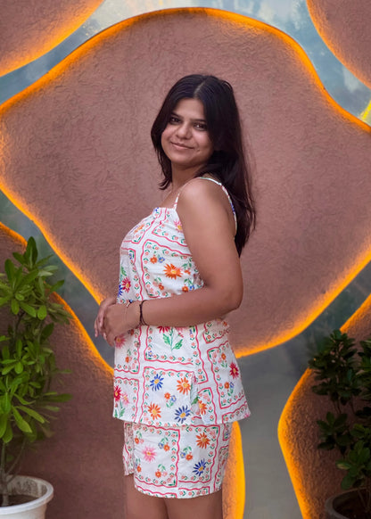 White patchwork floral sleeveless co-ord set with relaxed fit, soft cotton, and pockets for women by An-Attire.
