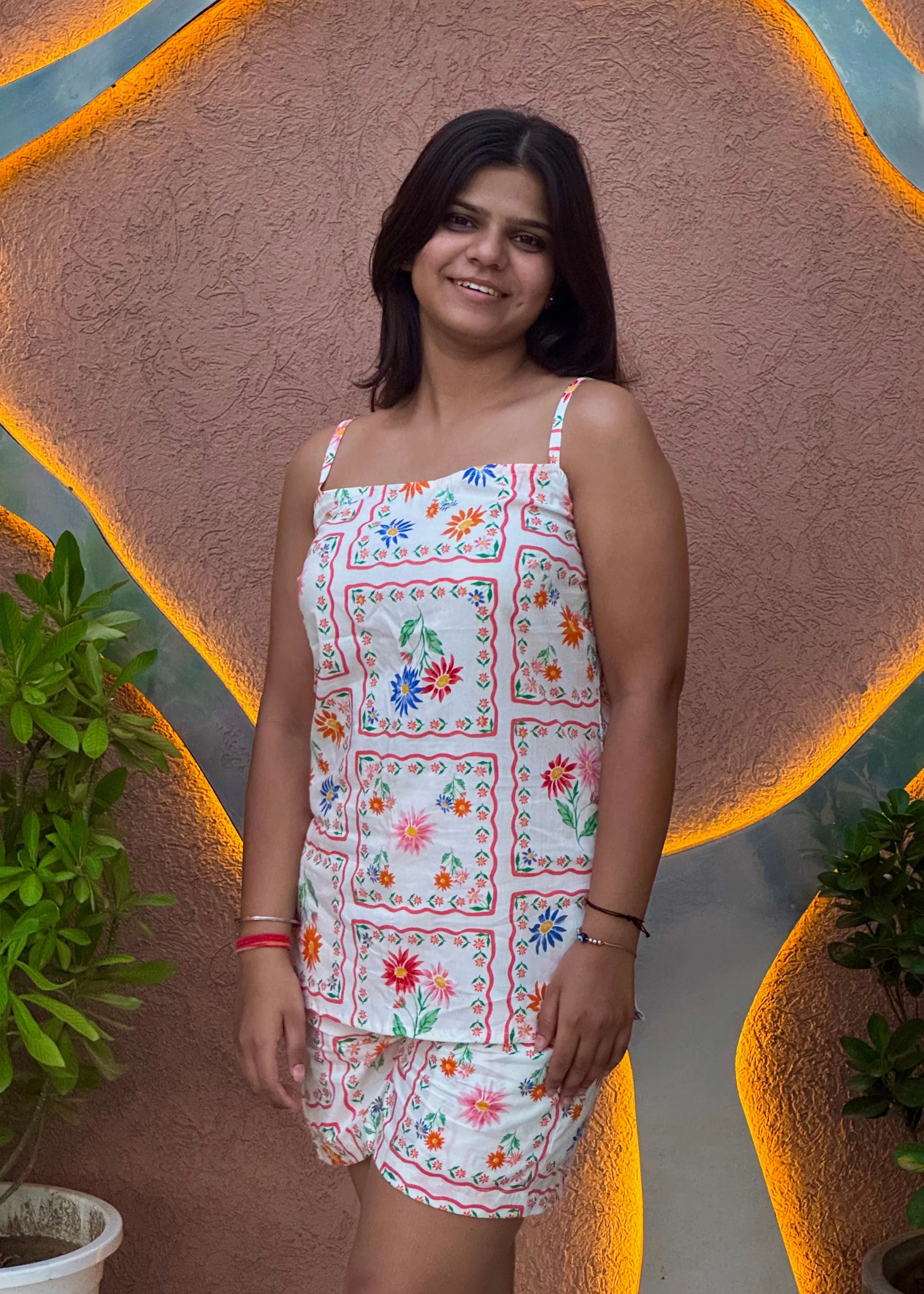 White patchwork floral sleeveless co-ord set with relaxed fit, soft cotton, and pockets for women by An-Attire.