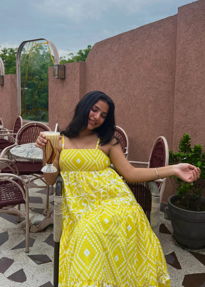Sunshine Yellow Printed Maxi Dress with geometric and floral patterns, soft fabric, and a flowing summer silhouette by An-Attire.