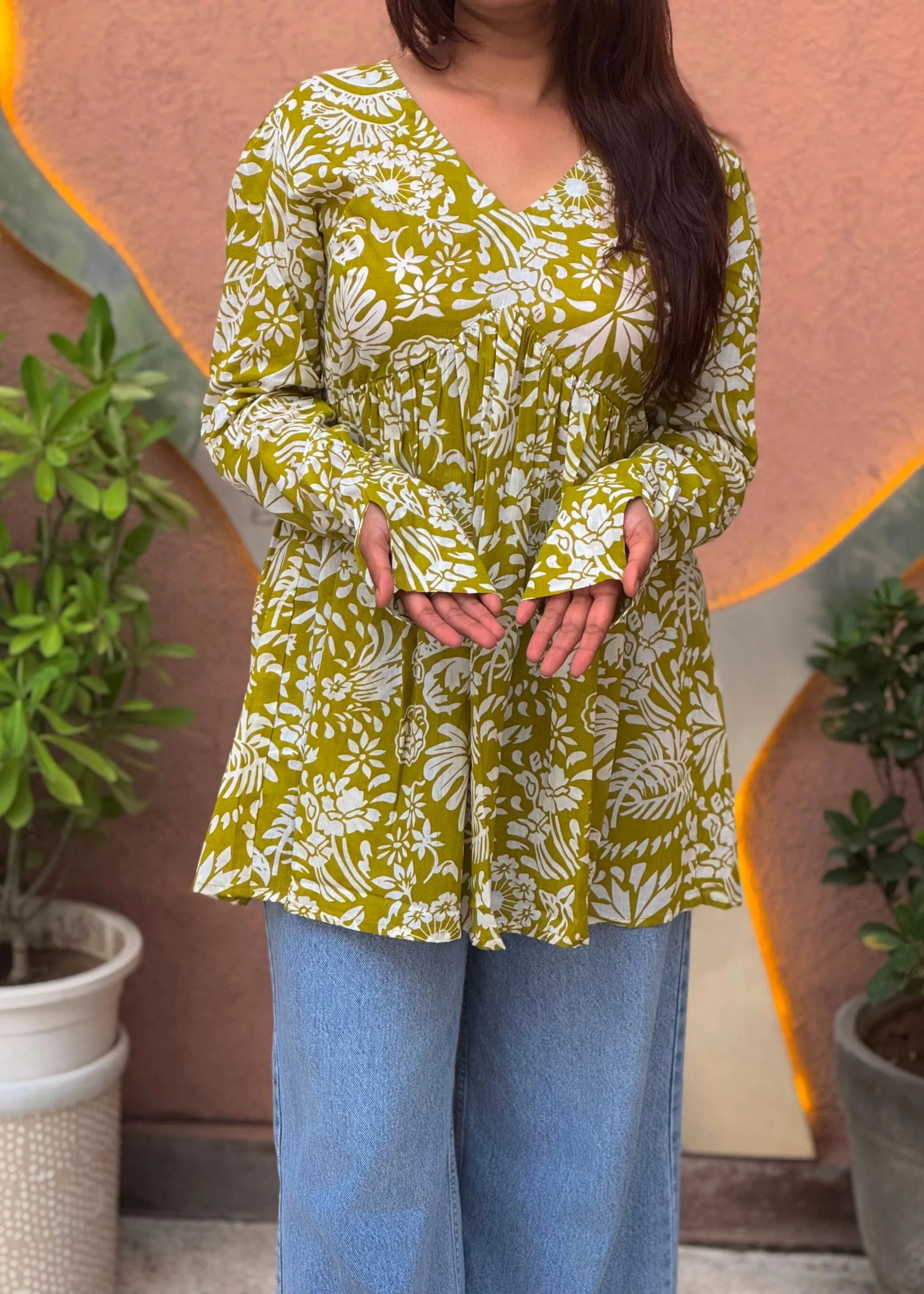 Yellow floral printed A-line dress with v-neck, full sleeves, soft cotton fabric, and elegant relaxed fit for women by An-Attire.